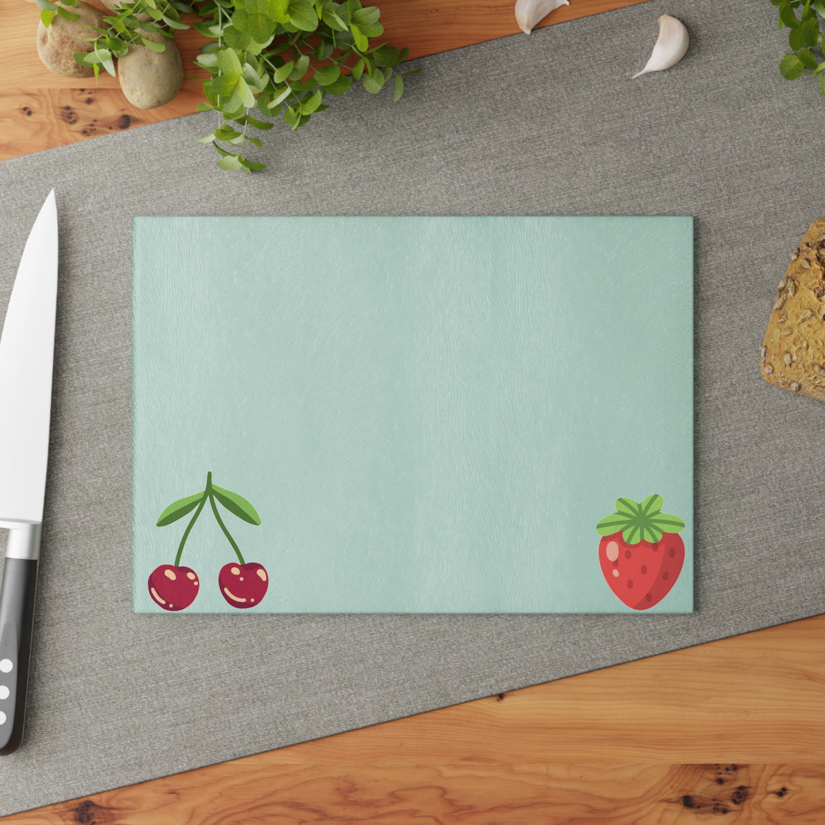 cherries and berries, glass cutting board