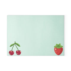 cherries and berries, glass cutting board
